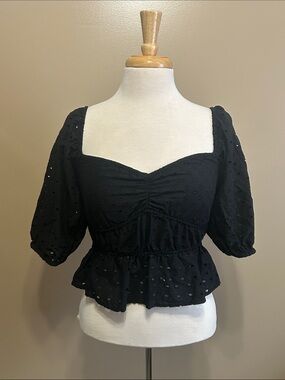Black Eyelet Puff-Sleeve Peplum Top